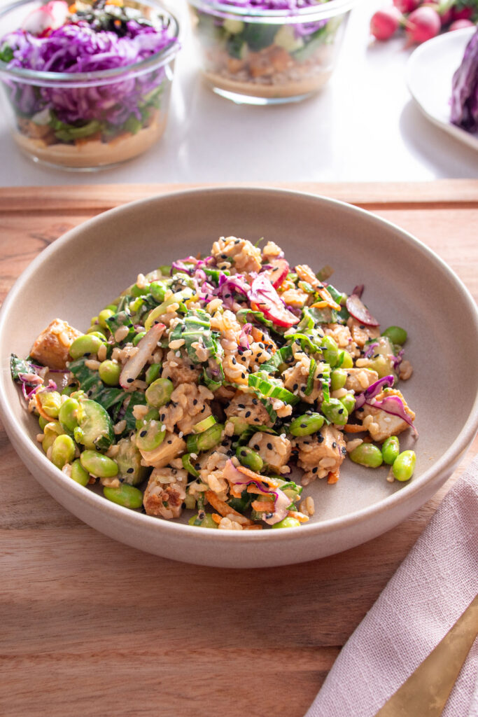 Vegan Poke Bowl Meal Prep container filled with layers of vegetables
