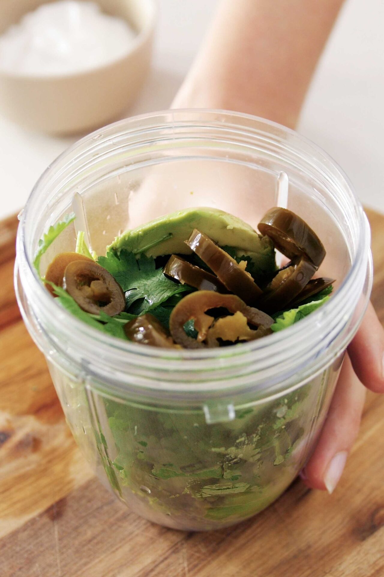 concocting the avocado cream that will form the base flavor of our tacos