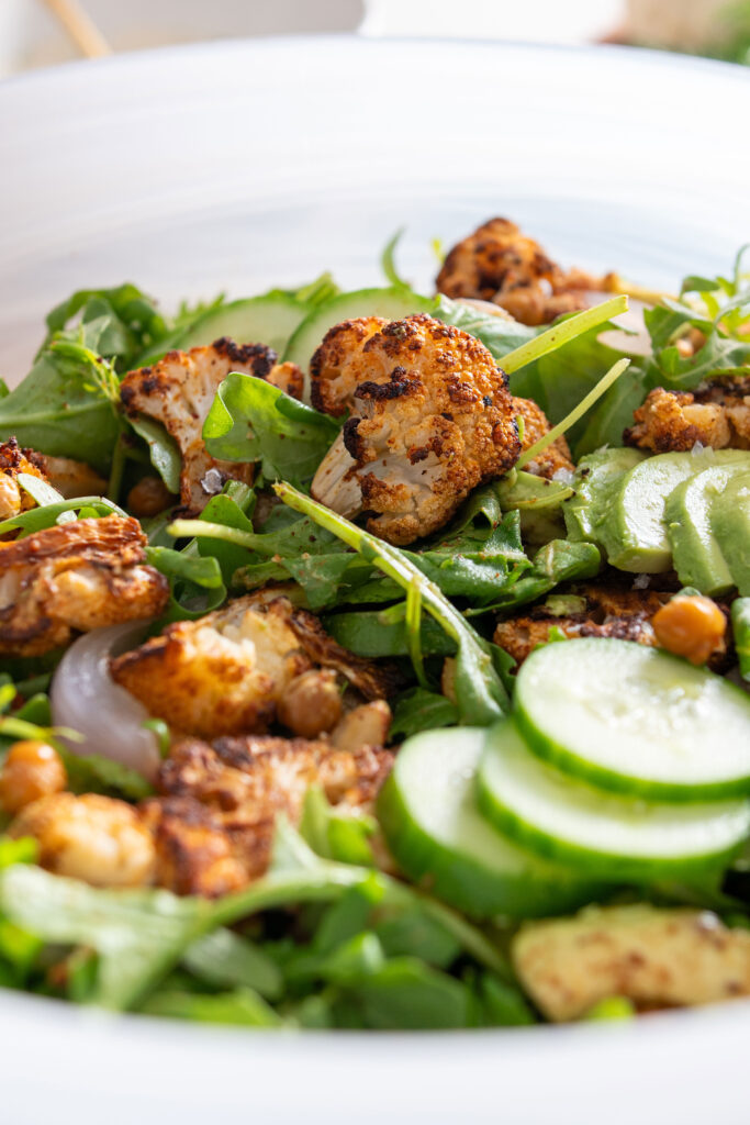 Close up of Large bowl with roasted cauliflower salad