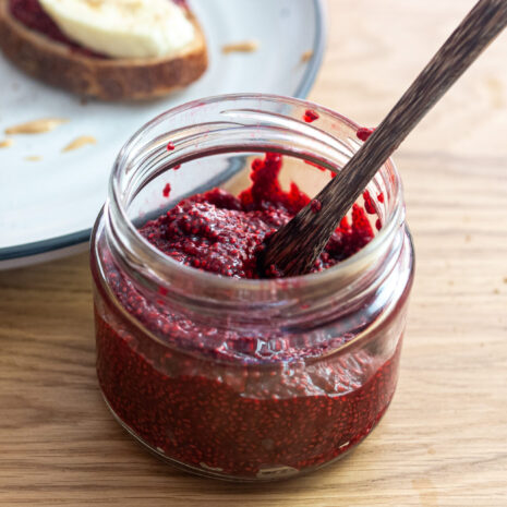 A vibrant jar of berry chia jam