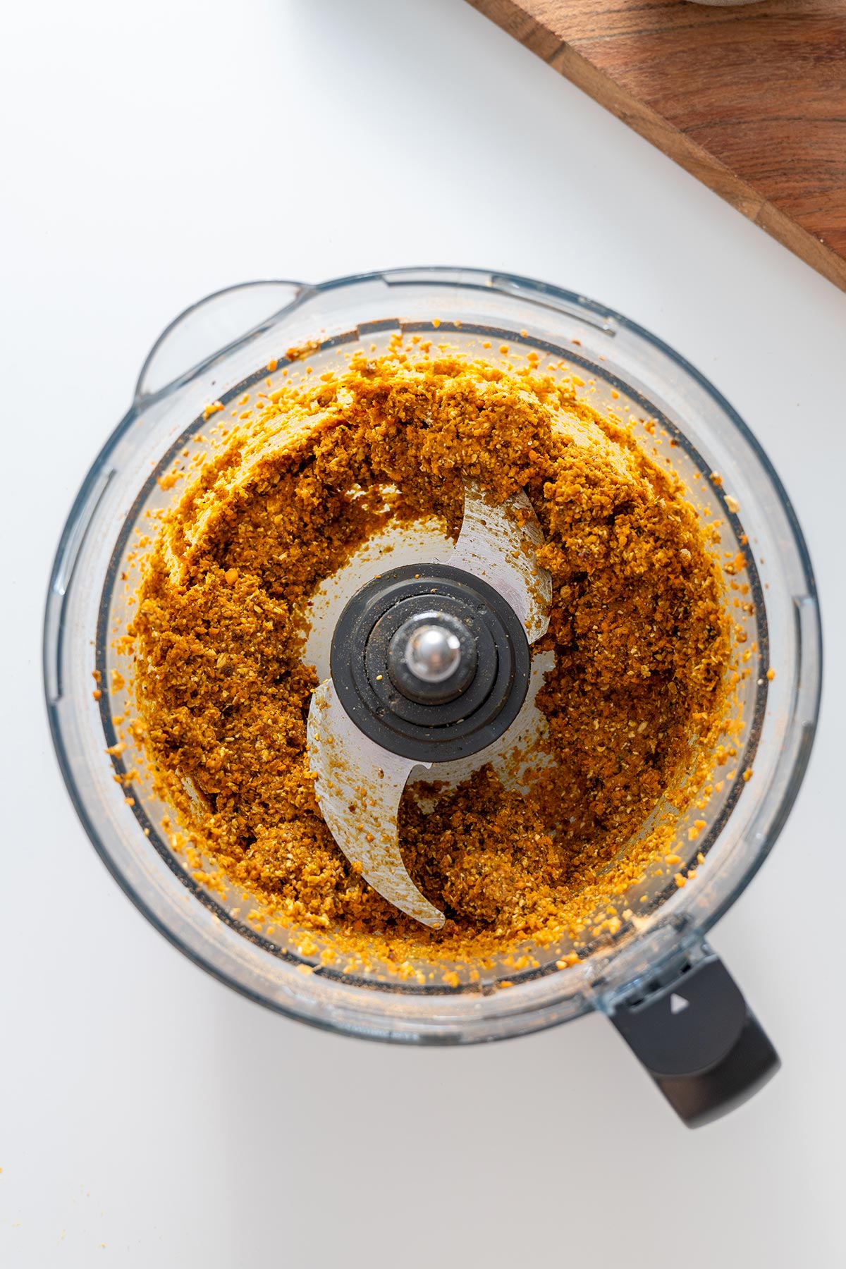 Food processor with Carrot Cake Bliss Ball mixture.