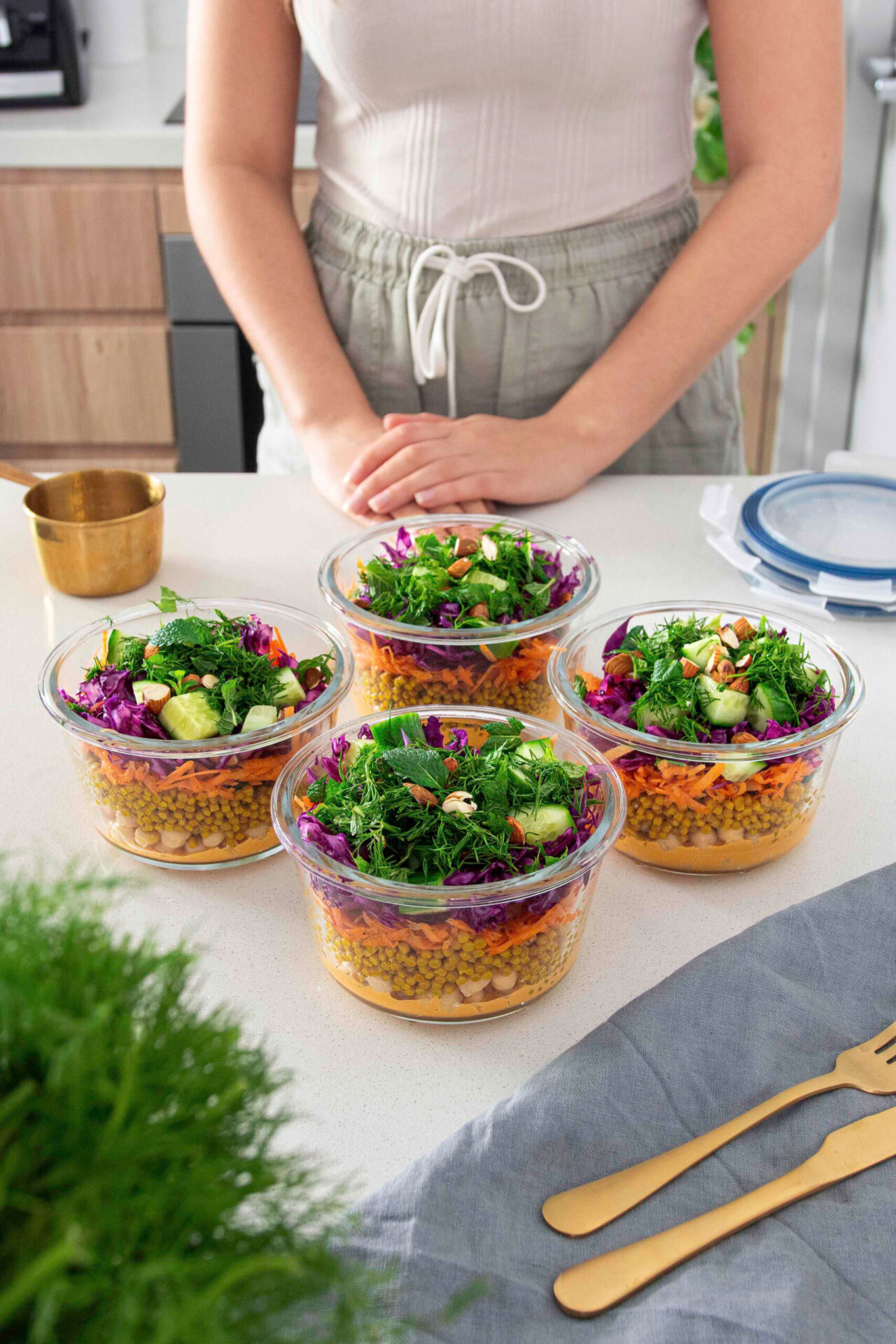 Chickpea, Turmeric Pearl Couscous & Creamy Harissa Salad Meal Prep in Containers