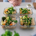A vibrant and aromatic vegan Green Thai Curry in multiple meal prep containers