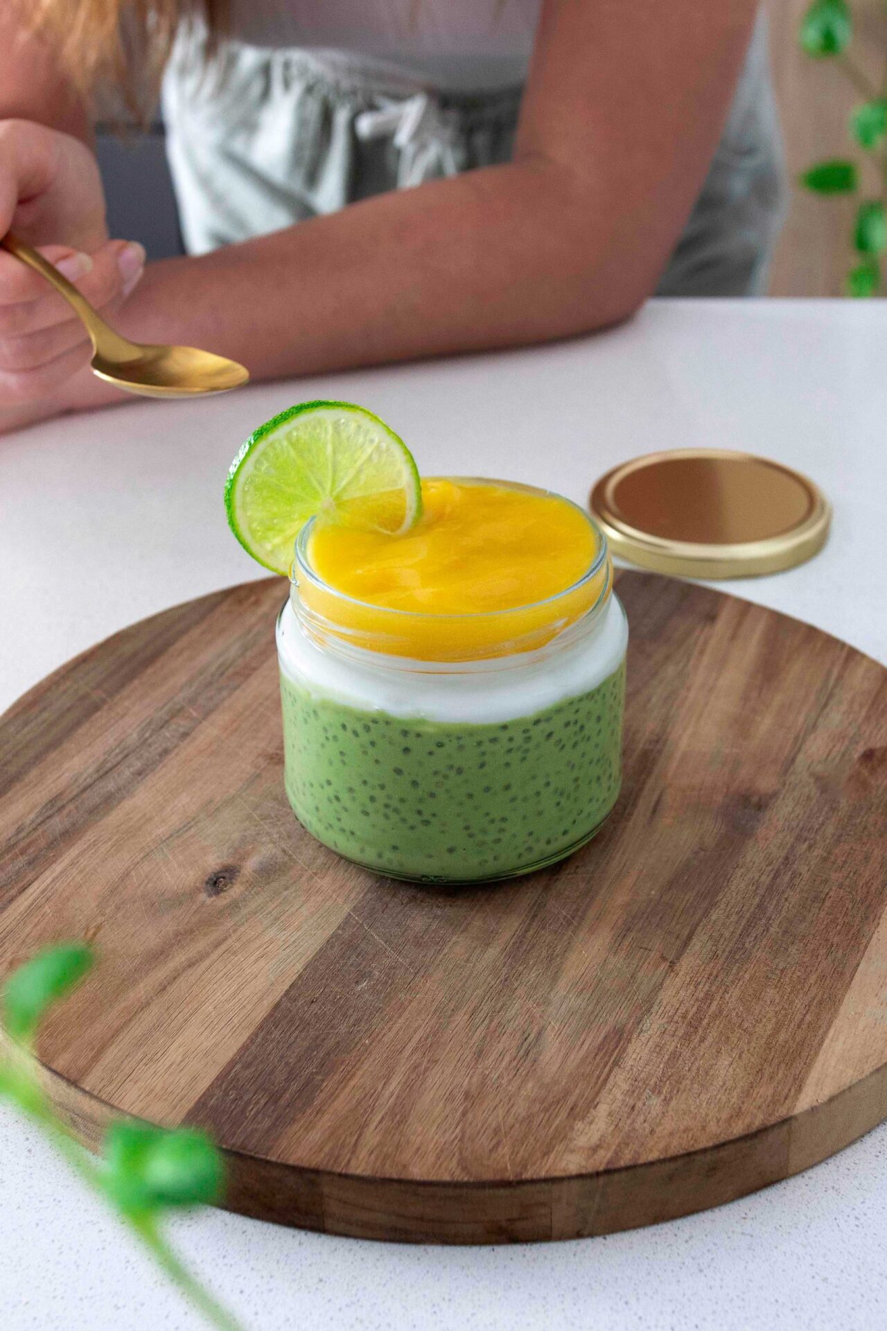 Jar of colorful, vibrant Matcha Chia Pudding