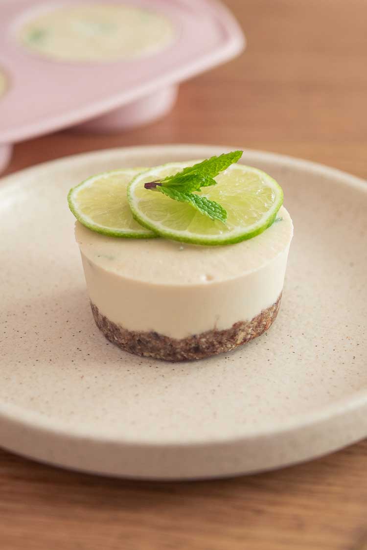 Dairy-free vegan mojito cheesecake with lime and mint toppings