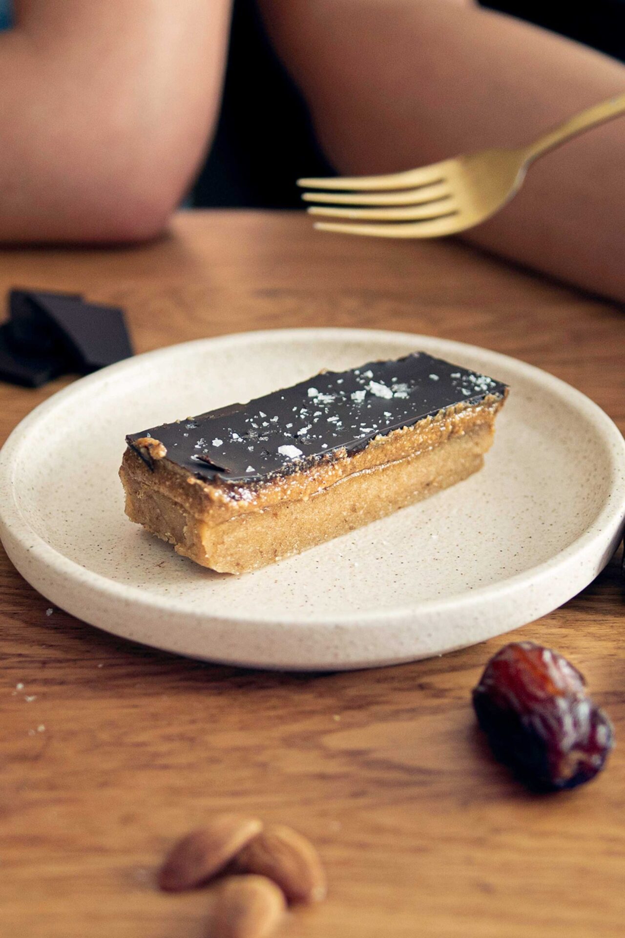 Nourishing, decadent caramel slice with multiple layers
