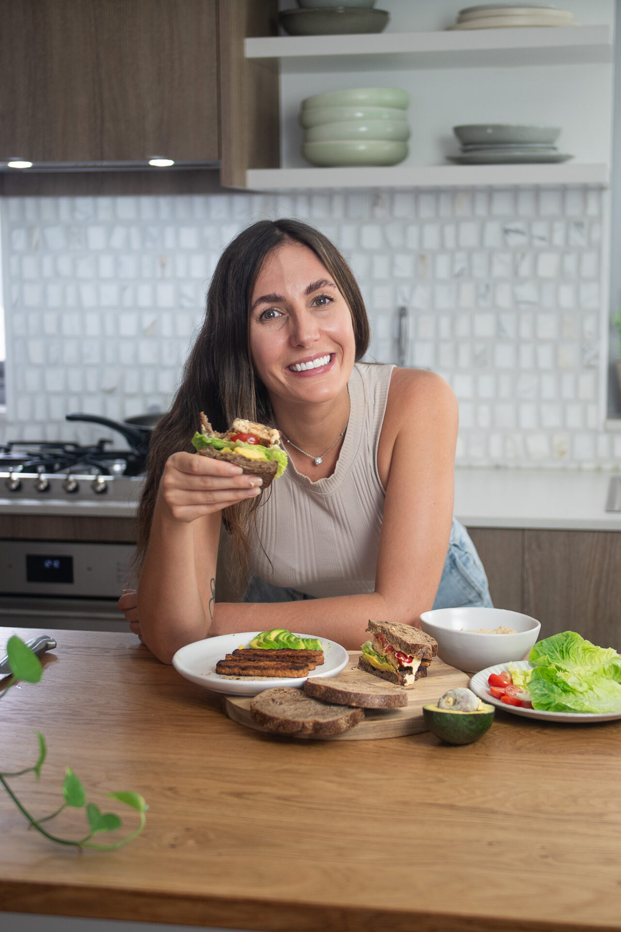 Sarah Cobacho of plantbaes with a plant-based BLT sandwich recipe