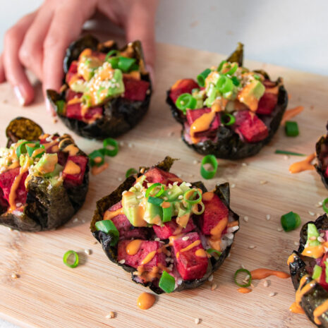 Viral spicy tofu, sushi muffins on a serving board
