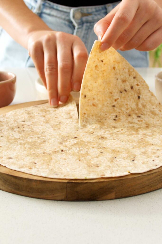 A tortilla wrap with a cut down the middle