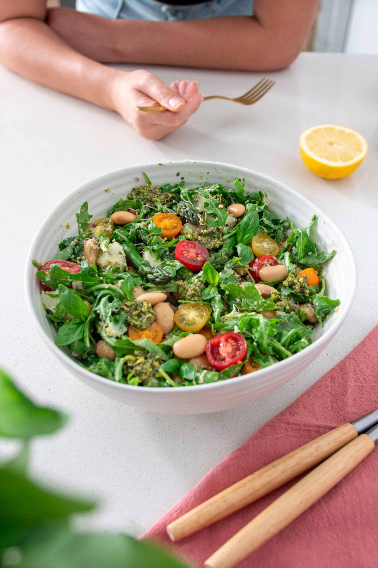 Vibrant salad bowl full of the Butter Bean Pesto Salad