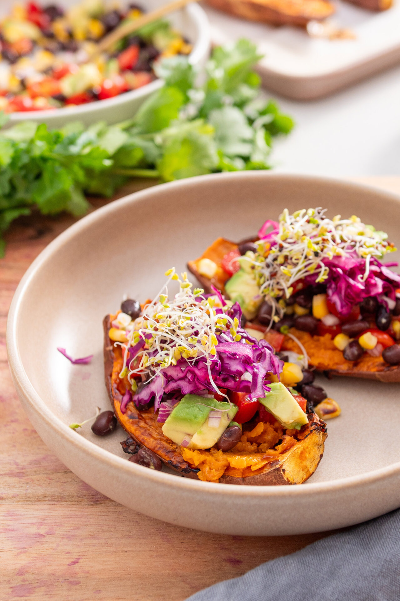 Close up of sweet potato stuffed with vibrant fillings