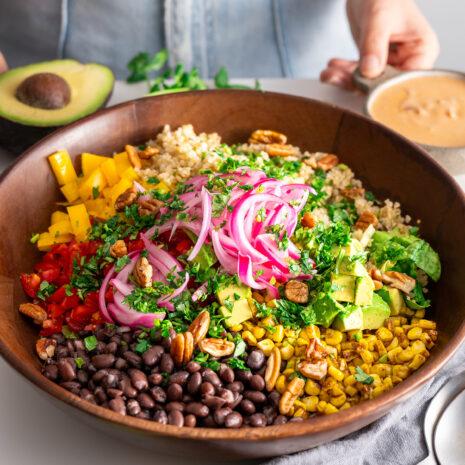 Chopped Southwest Salad ready to eat with a fork and napkin.