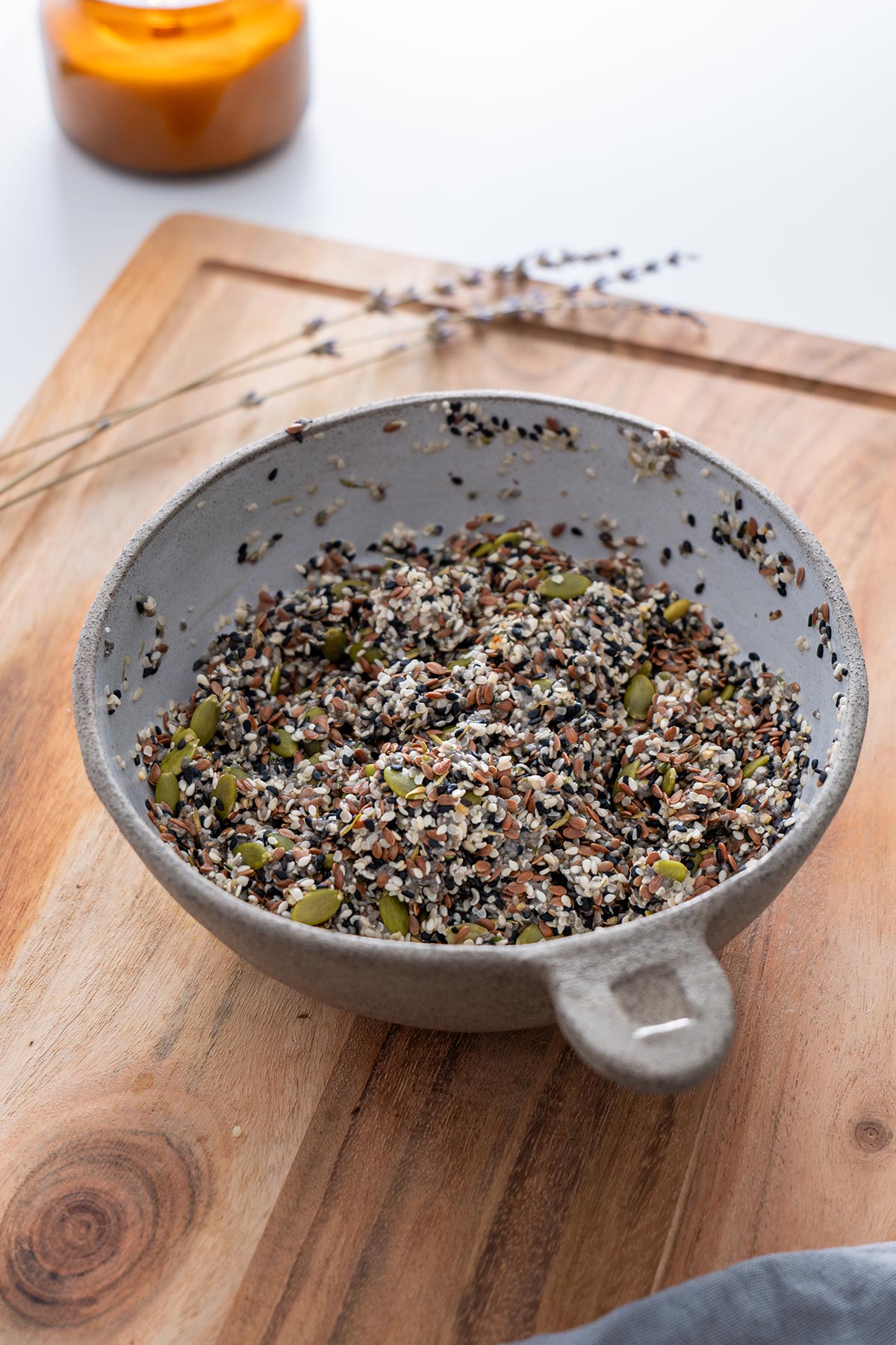 Mixing bowl of soaked seeds for oil-free, flour-free crackers preparation.