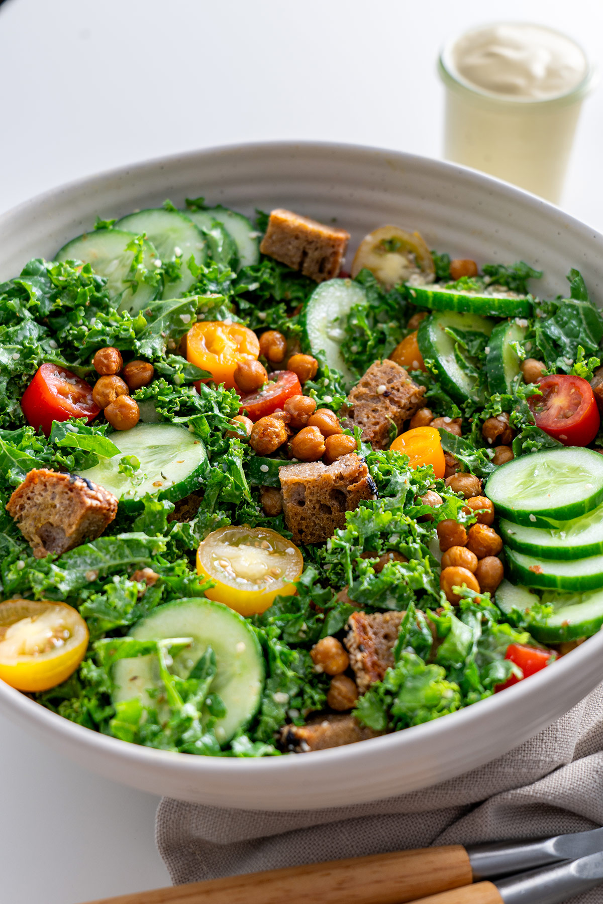 Close-up of High-Protein Kale Caesar Salad highlighting the texture and fresh ingredients.