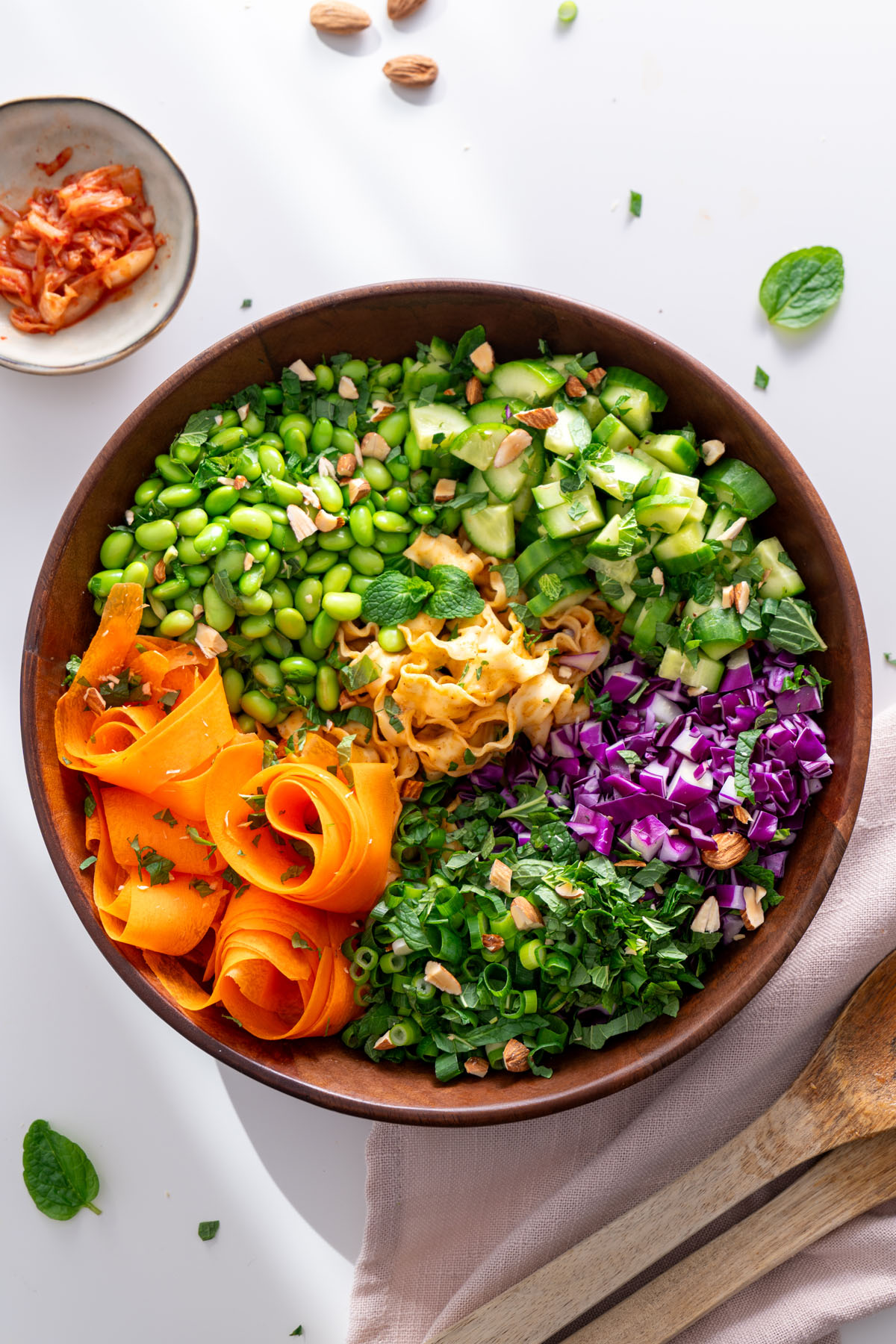 High-protein noodle salad in a bowl with vibrant vegetables.