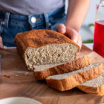 Close-up of the red lentil quinoa bread loaf showing its soft texture.