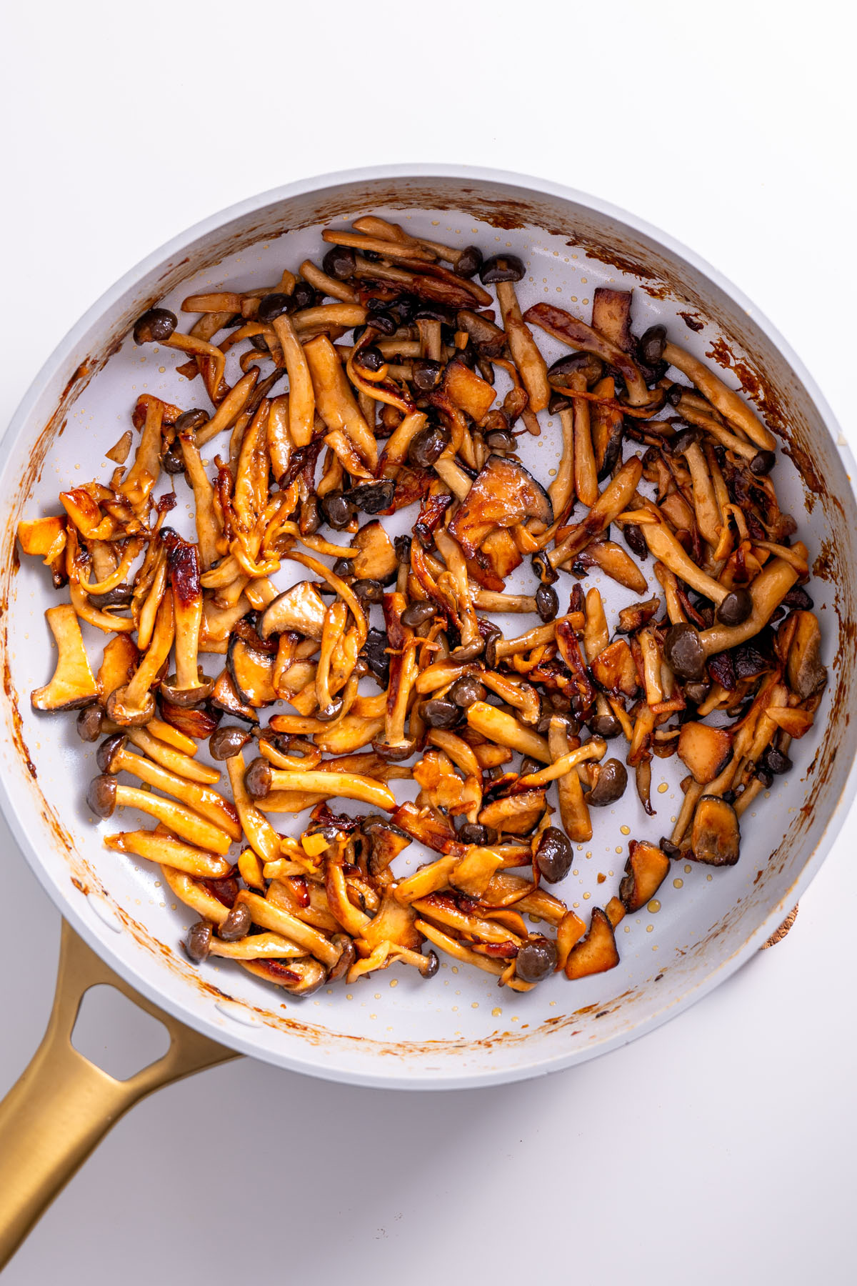 Cooked mushrooms coated in gochujang marinade for crispy rice salad.