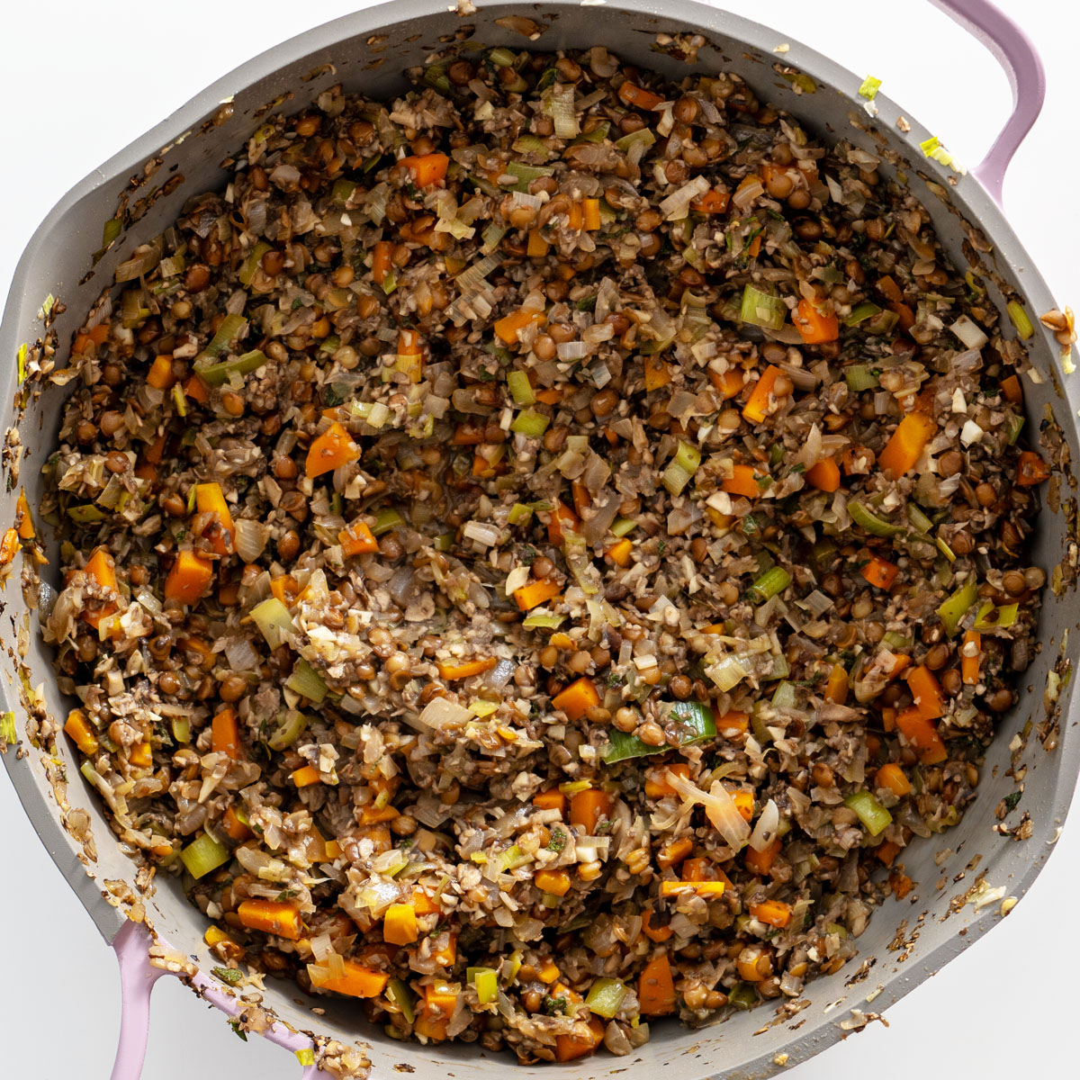 Process shot of cooked mushroom Wellington filling in a pan, ready to cool.