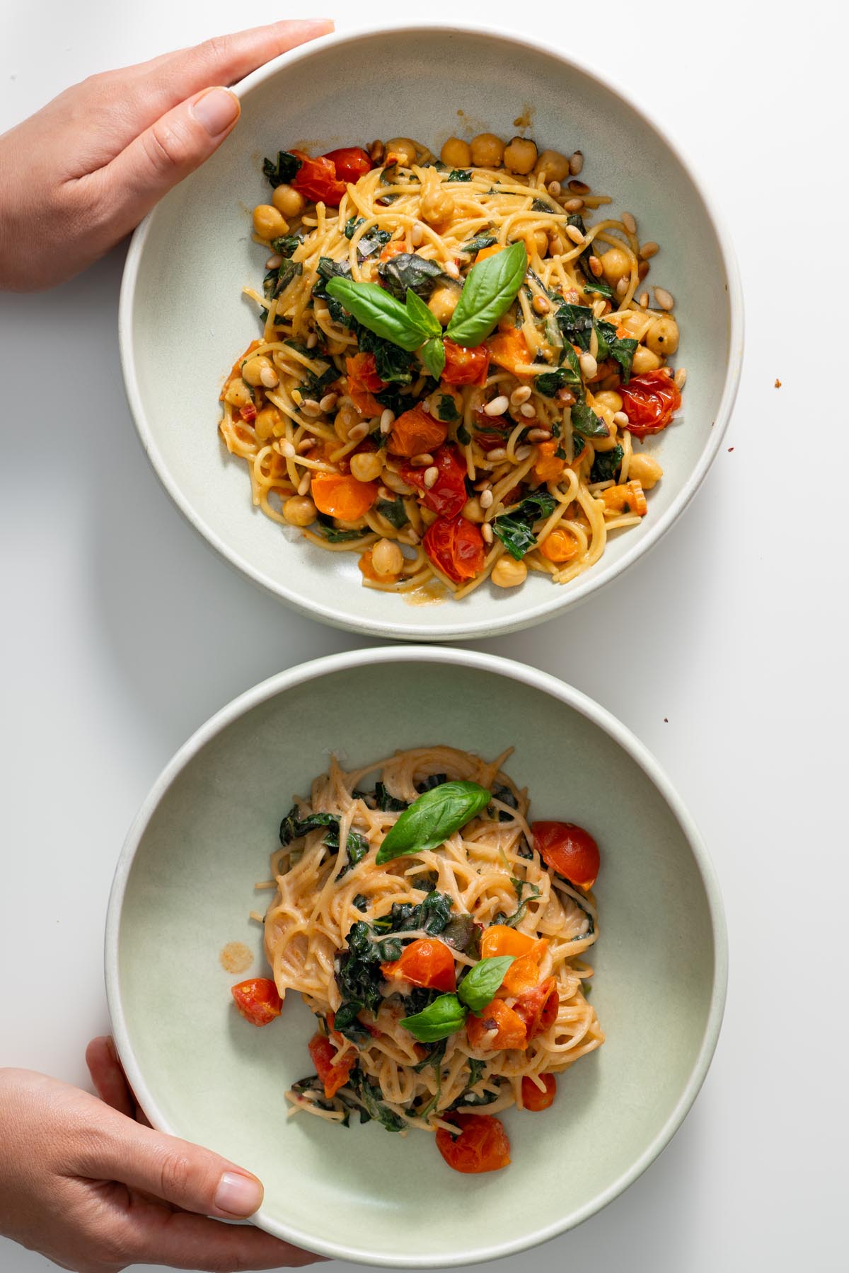 Two bowls of pasta side by side, showing the difference between Meghan Markle’s original one-pot pasta and Sarah’s upgraded version.