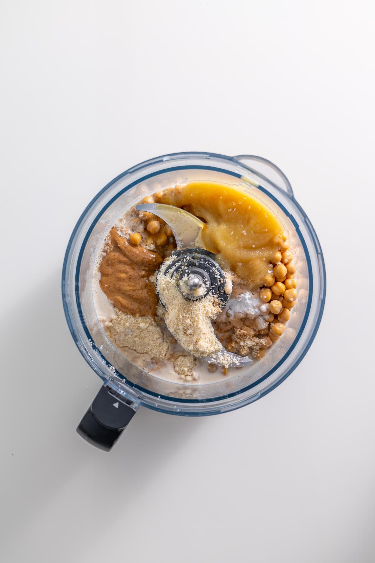 Top view of all blondie ingredients blended together in a food processor before mixing.