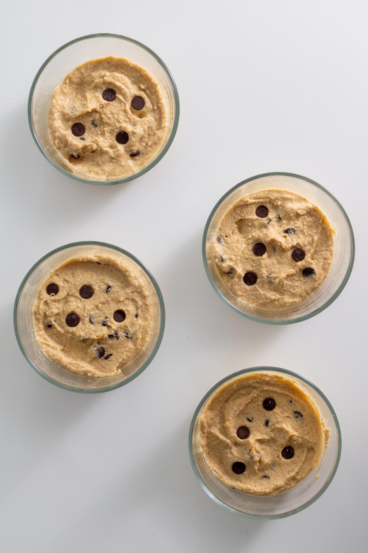 Small glass jar filled with smooth miso date caramel sauce.