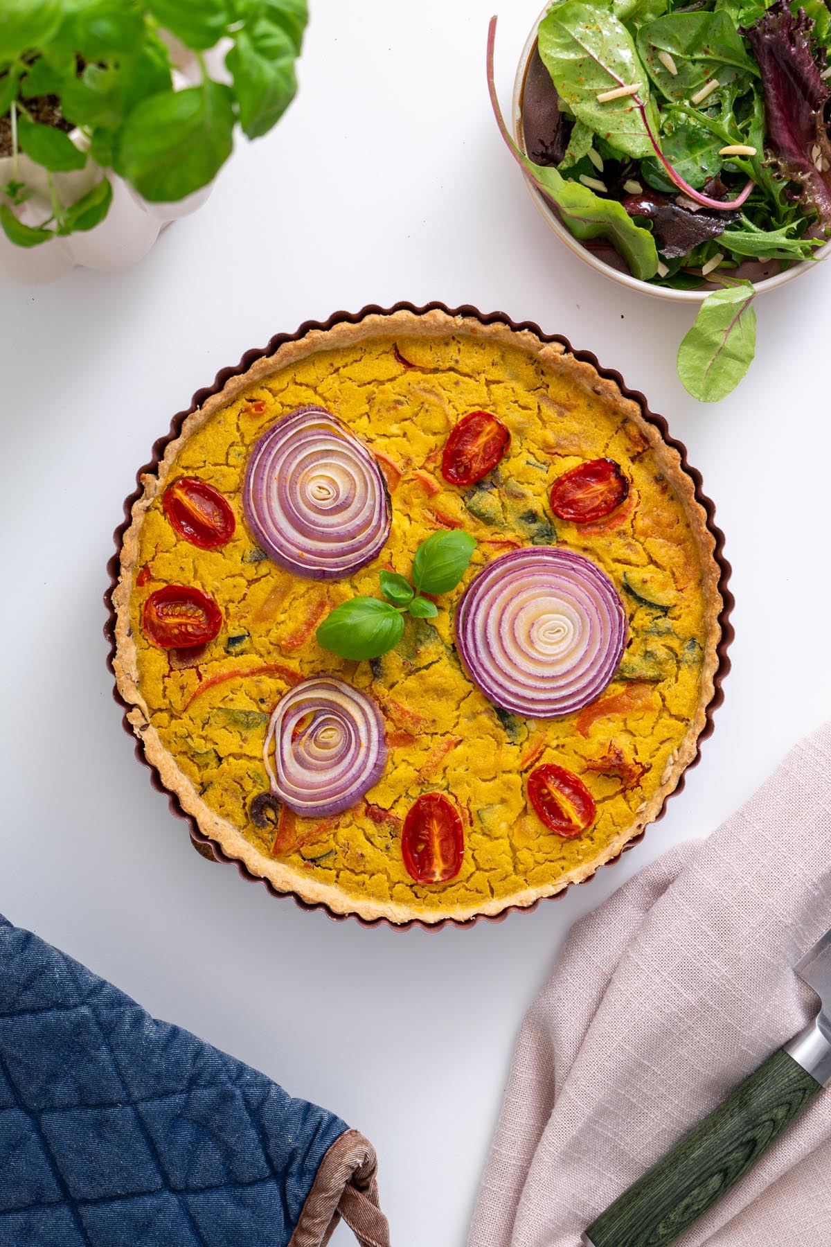 Side view of filled tart before baking