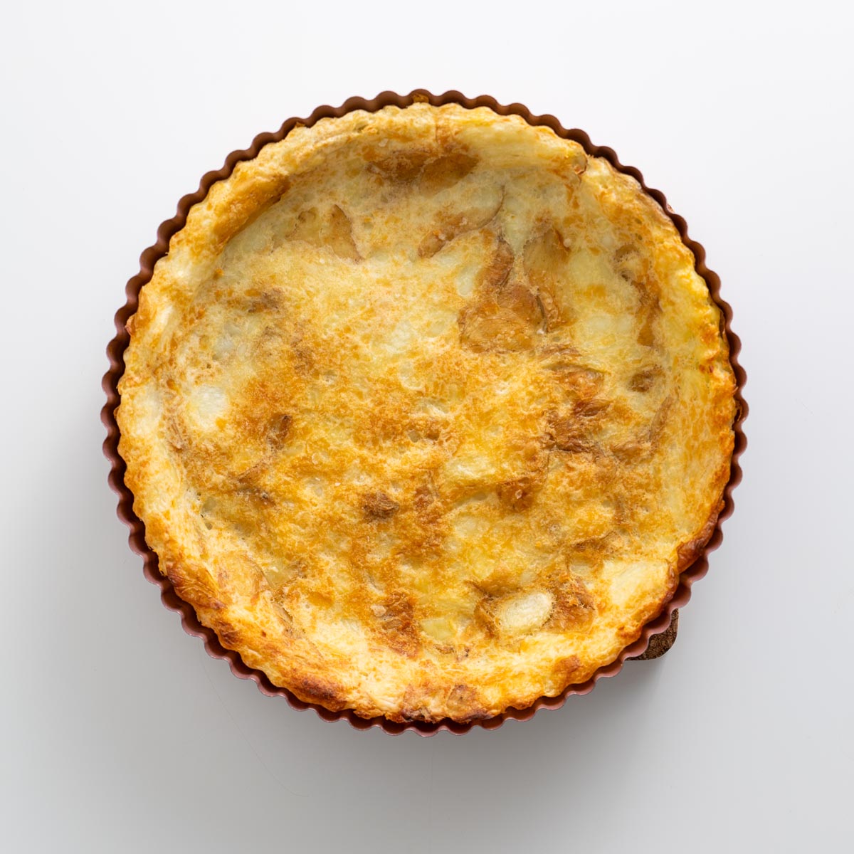 Baked potato crust topped with dairy-free tzatziki spread